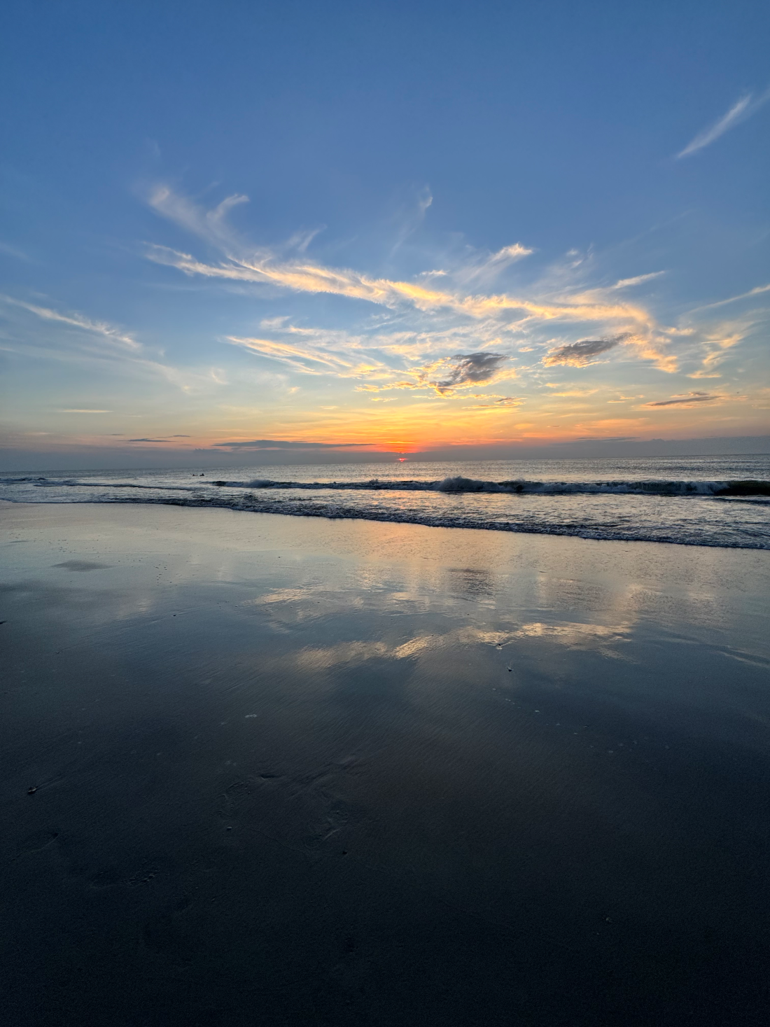 Sunrise over the ocean symbolizing new beginnings and overcoming fear.